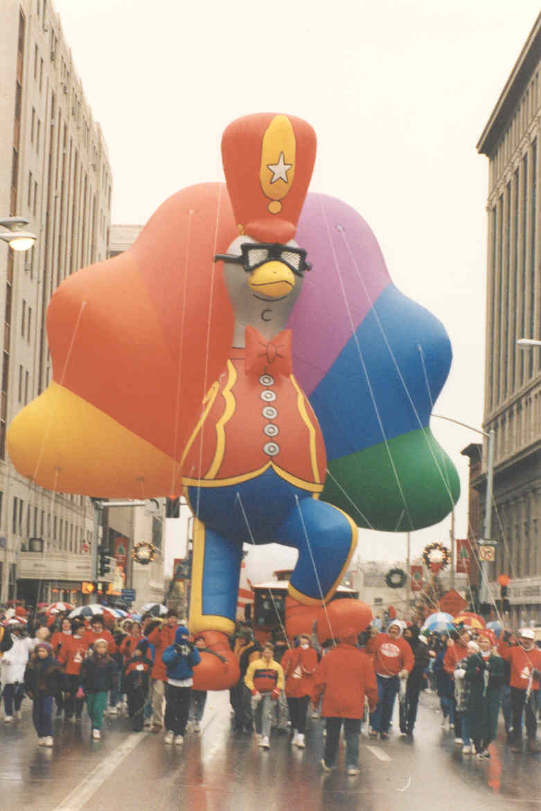 KWQCTV-6 helium balloon in parade.  KWQCTV-6 provides television coverage